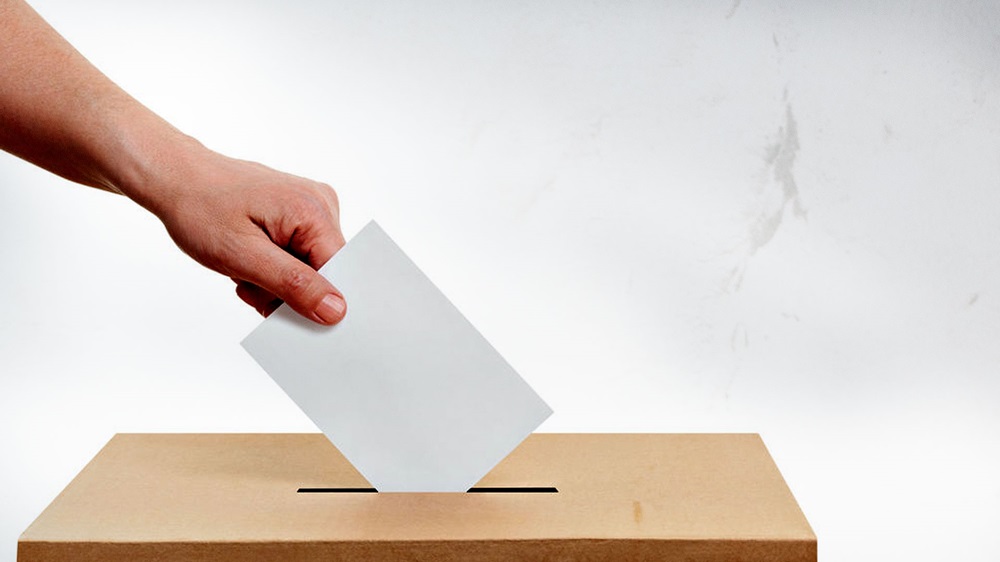 What happens to ballot boxes used in elections after polls close?