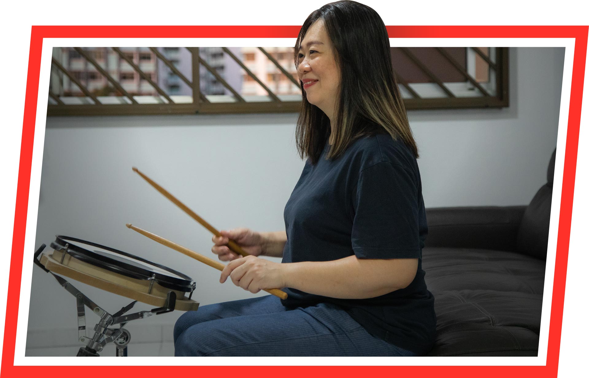 Lily Goh playing drum pad